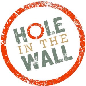 tri arts sponsor "hole in the wall" logo